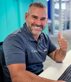 XP team member giving a thumbs up